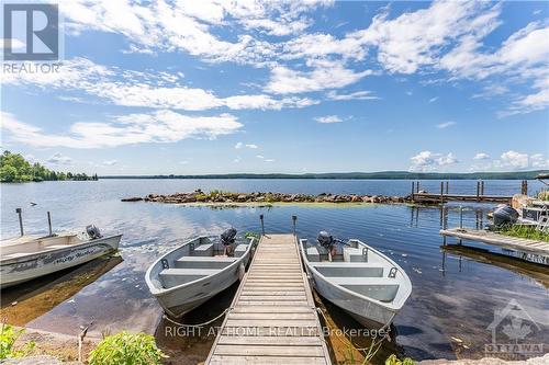 5253 Calabogie Road, Greater Madawaska, ON - Outdoor With Body Of Water With View