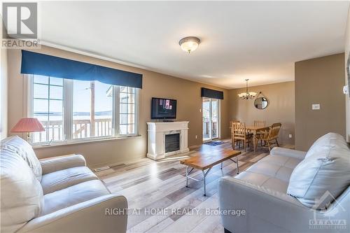 5253 Calabogie Road, Greater Madawaska, ON - Indoor Photo Showing Living Room With Fireplace