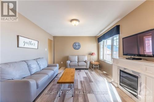 5253 Calabogie Road, Greater Madawaska, ON - Indoor Photo Showing Living Room With Fireplace