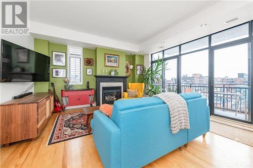 364 Cooper Street Unit#504, Ottawa, ON - Indoor Photo Showing Living Room With Fireplace