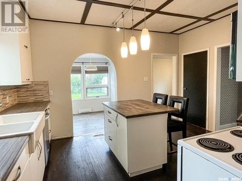 507 1St Street E, Meadow Lake, SK - Indoor Photo Showing Kitchen With Double Sink