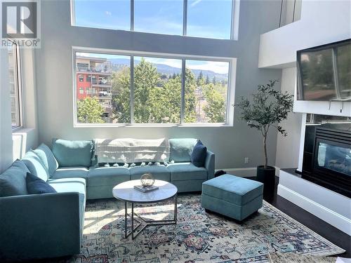 136 Front Street Unit# 311, Penticton, BC - Indoor Photo Showing Living Room With Fireplace