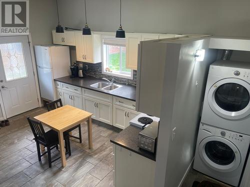 7818 Sage Drive, Coldstream, BC - Indoor Photo Showing Laundry Room