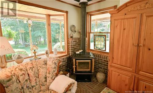 1987 Lakeview Road, Cambridge-Narrows, NB - Indoor Photo Showing Other Room With Fireplace