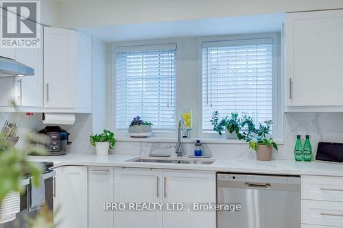 126 - 50 Strathhaven Drive, Mississauga, ON - Indoor Photo Showing Kitchen With Double Sink