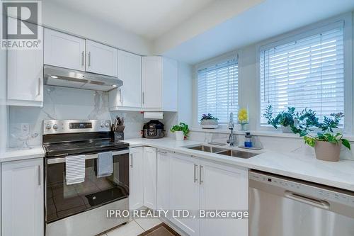 126 - 50 Strathhaven Drive, Mississauga, ON - Indoor Photo Showing Kitchen With Double Sink