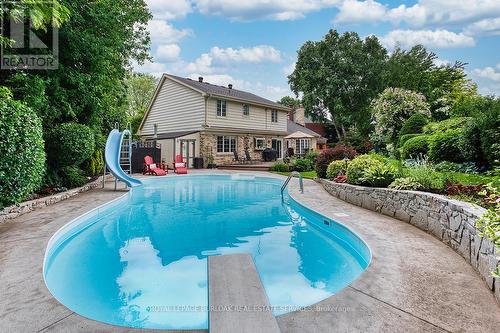 4173 Corrine Court, Burlington, ON - Outdoor With In Ground Pool With Deck Patio Veranda With Backyard