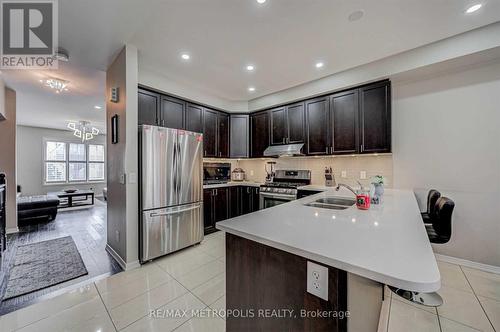 128 Cedar Lake Crescent, Brampton, ON - Indoor Photo Showing Kitchen With Stainless Steel Kitchen With Double Sink
