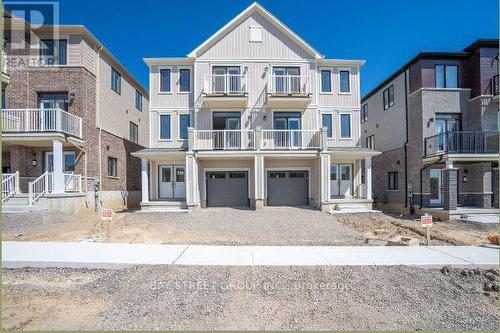 17 Central Market Drive, Haldimand, ON - Outdoor With Balcony With Facade