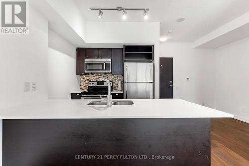 301 - 105 The Queensway Avenue, Toronto, ON - Indoor Photo Showing Kitchen With Double Sink