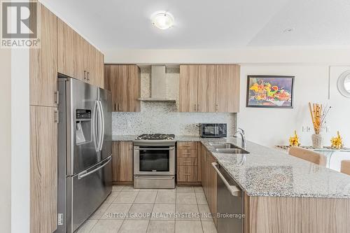 8575 Financial Drive, Brampton, ON - Indoor Photo Showing Kitchen With Double Sink With Upgraded Kitchen