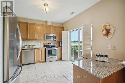 509 - 1499 Nottinghill Gate, Oakville, ON - Indoor Photo Showing Kitchen