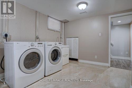 93 Amberjack Boulevard, Toronto, ON - Indoor Photo Showing Laundry Room