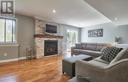 44 Mcauley Drive, Quinte West, ON - Indoor Photo Showing Living Room With Fireplace
