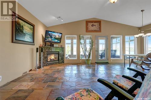 758 Tatanka Drive, Buffalo Pound Lake, SK - Indoor Photo Showing Living Room With Fireplace