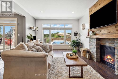 22 Stonefield Gate, Middlesex Centre, ON - Indoor Photo Showing Living Room With Fireplace