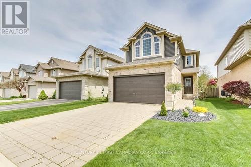 1448 Mickleborough Drive, London, ON - Outdoor With Facade