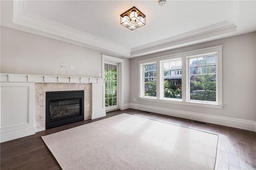 100 Kensington Avenue S, Hamilton, ON - Indoor Photo Showing Living Room With Fireplace