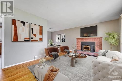 Virtually Staged - 92 Martin Street, Richmond, ON - Indoor Photo Showing Living Room With Fireplace