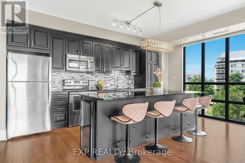303 - 45 Yorkland Boulevard, Brampton, ON - Indoor Photo Showing Kitchen With Stainless Steel Kitchen With Upgraded Kitchen