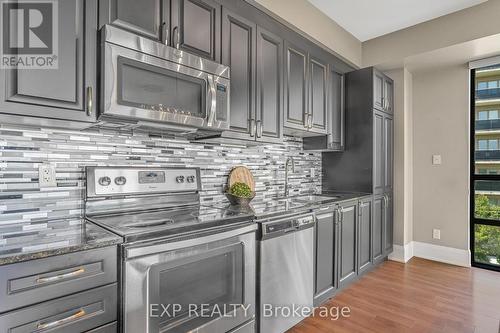 303 - 45 Yorkland Boulevard, Brampton, ON - Indoor Photo Showing Kitchen With Upgraded Kitchen