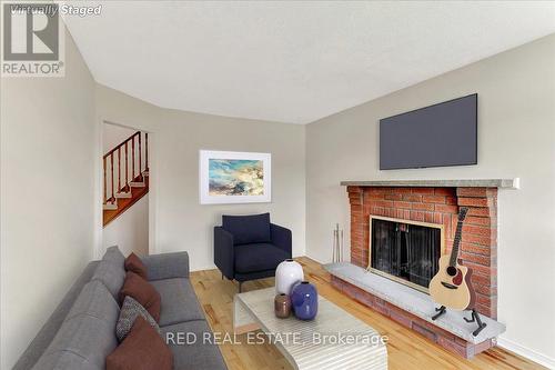 41 Macmillan Crescent, Barrie, ON - Indoor Photo Showing Living Room With Fireplace