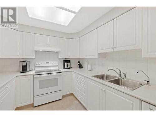 1965 Durnin Road Unit# 217, Kelowna, BC - Indoor Photo Showing Kitchen With Double Sink