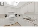 1965 Durnin Road Unit# 217, Kelowna, BC  - Indoor Photo Showing Kitchen With Double Sink 