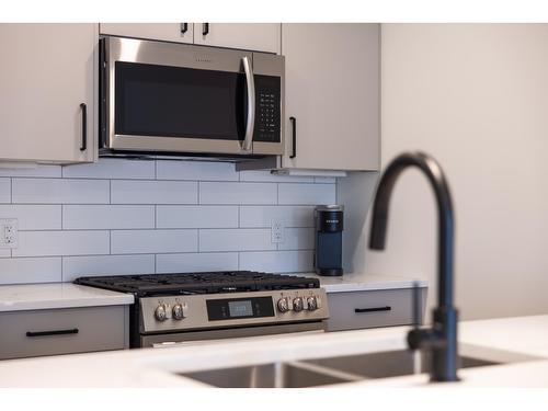 103 - 800 Riverside Way, Fernie, BC - Indoor Photo Showing Kitchen With Upgraded Kitchen