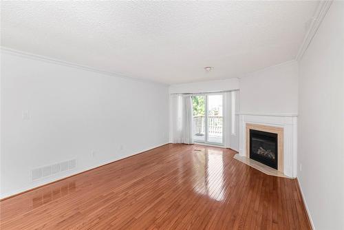 2155 Duncaster Drive|Unit #34, Burlington, ON - Indoor With Fireplace