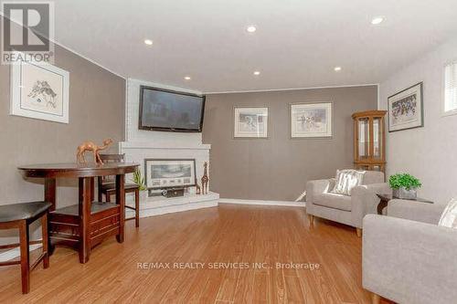 32 Simmons Boulevard, Brampton, ON - Indoor Photo Showing Living Room With Fireplace