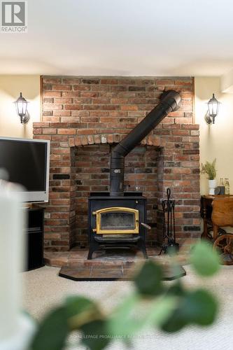 3343 Baker Road N, Hamilton Township, ON - Indoor With Fireplace