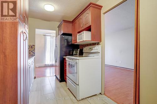 211 - 1250 Bridletowne Circle S, Toronto, ON - Indoor Photo Showing Laundry Room