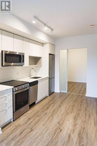 412 - 630 Greenwood Avenue, Toronto, ON - Indoor Photo Showing Kitchen With Stainless Steel Kitchen