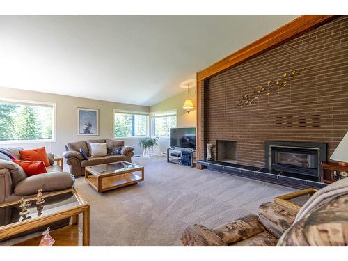 105 Castle Mountain Road, Fernie, BC - Indoor Photo Showing Living Room With Fireplace