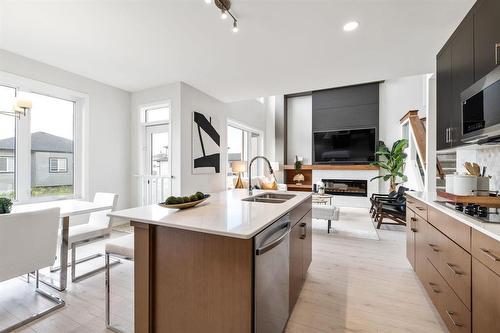 57 Marigold Road, West St Paul, MB - Indoor Photo Showing Kitchen With Double Sink