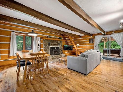 Living room - 1307 Rue Du Sous-Bois, Mont-Blanc, QC - Indoor With Fireplace