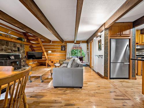 Living room - 1307 Rue Du Sous-Bois, Mont-Blanc, QC - Indoor With Fireplace