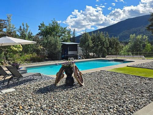 9073 Kealty Road, Kamloops, BC - Outdoor With In Ground Pool With Backyard