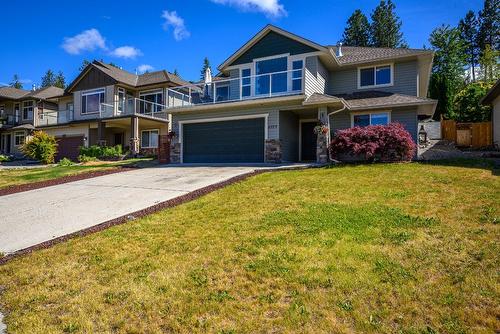 4979 Windsong Crescent, Kelowna, BC - Outdoor With Balcony With Facade