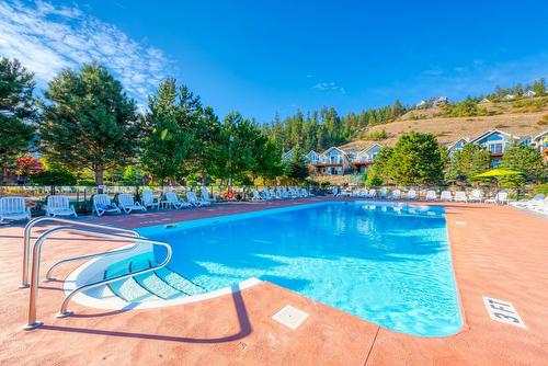 431-6987 Terazona Drive, Kelowna, BC - Outdoor With In Ground Pool