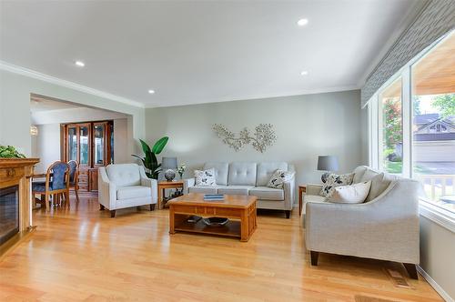 1142 Wintergeen Drive, Kelowna, BC - Indoor Photo Showing Living Room With Fireplace