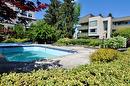 203-1056 Bernard Avenue, Kelowna, BC  - Outdoor With In Ground Pool 