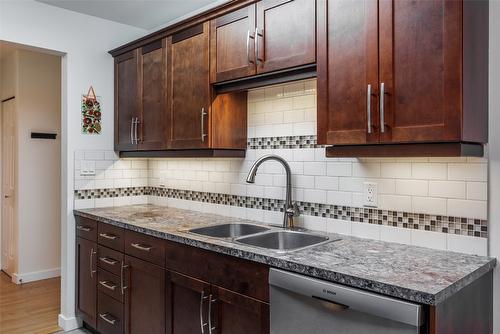 203-1056 Bernard Avenue, Kelowna, BC - Indoor Photo Showing Kitchen With Double Sink
