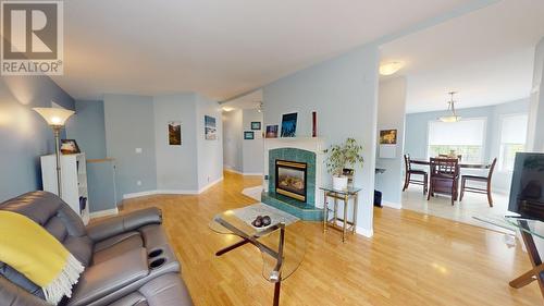 9885 73 Avenue, Fort St. John, BC - Indoor Photo Showing Living Room With Fireplace