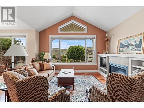 7760 Okanagan Landing Road Unit# 50, Vernon, BC - Indoor Photo Showing Living Room With Fireplace