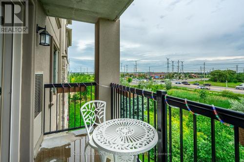 305 - 1470 Main Street E, Milton, ON - Outdoor With Balcony With View With Exterior