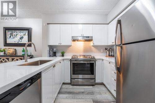 305 - 1470 Main Street E, Milton, ON - Indoor Photo Showing Kitchen With Stainless Steel Kitchen With Upgraded Kitchen