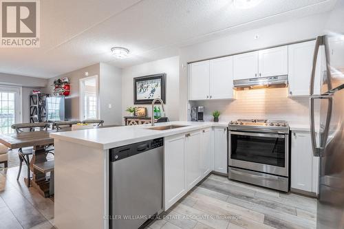 305 - 1470 Main Street E, Milton, ON - Indoor Photo Showing Kitchen With Stainless Steel Kitchen