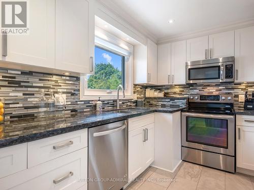 54 Exbury Road, Toronto, ON - Indoor Photo Showing Kitchen With Stainless Steel Kitchen With Double Sink With Upgraded Kitchen